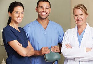 smiling dental staff members